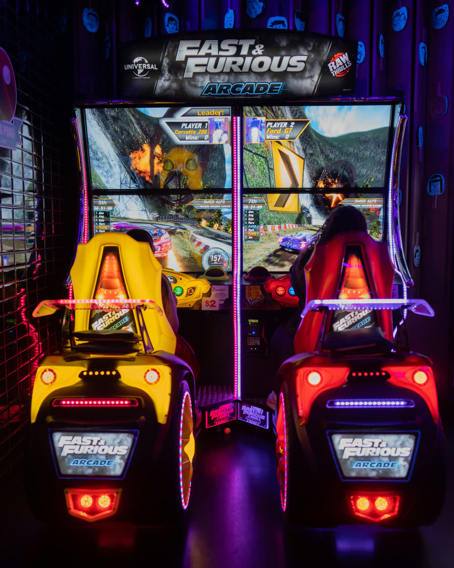 Arcade racing cabinets at Space Ping Pong