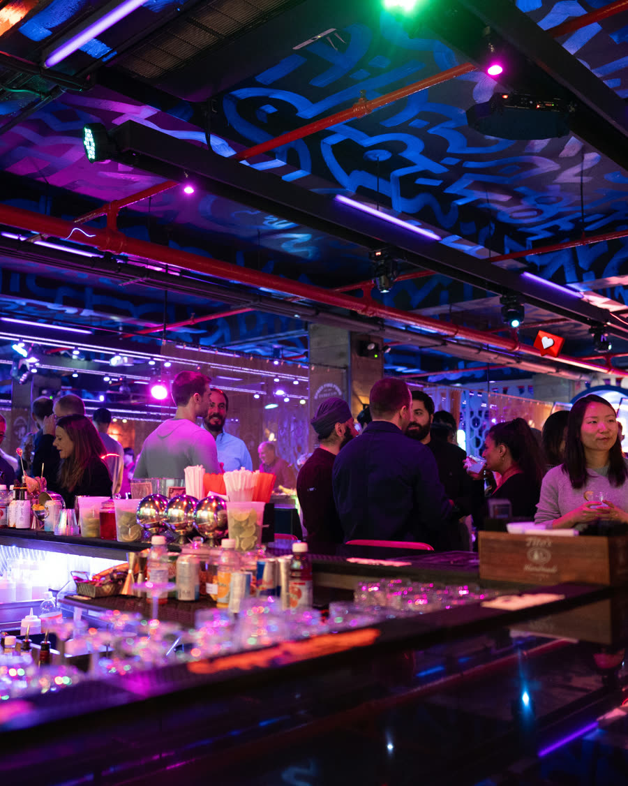 Crowd celebrating at the Space Ping Pong bar